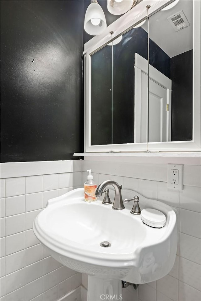 10633 Chiquita St, Toluca Lake, CA 91602 - bathroom with tile walls and a sink