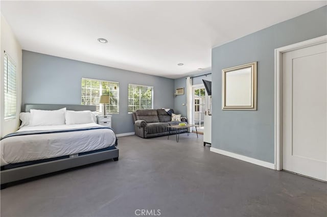 10633 Chiquita St, Toluca Lake, CA 91602 - bedroom featuring baseboards, concrete floors, and recessed lighting