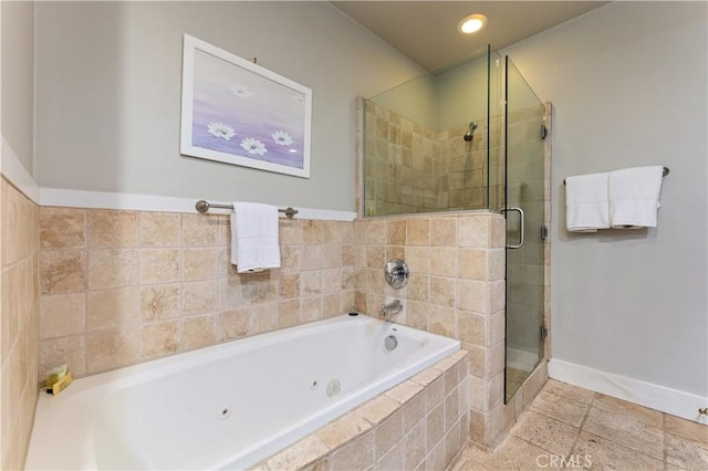 10633 Chiquita St, Toluca Lake, CA 91602 - full bathroom with a shower stall, a tub with jets, and baseboards