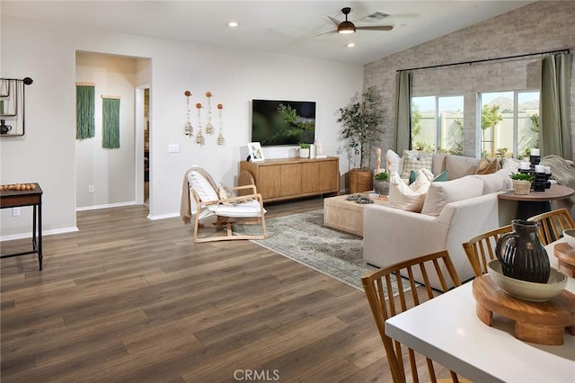 living room with vaulted ceiling, recessed lighting, baseboards, ceiling fan, and wood finished floors