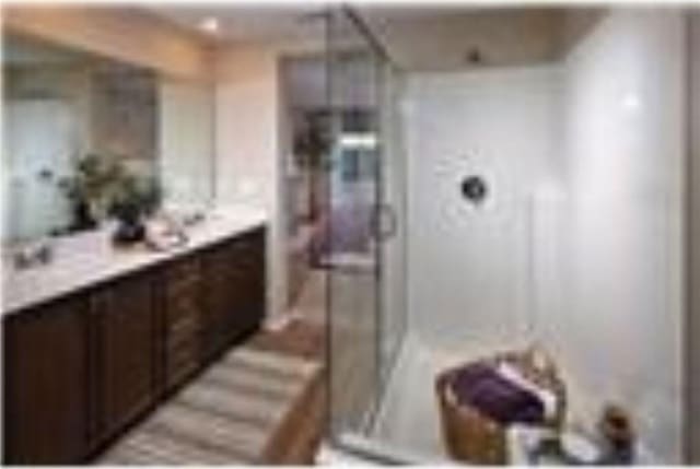 full bath with a walk in shower