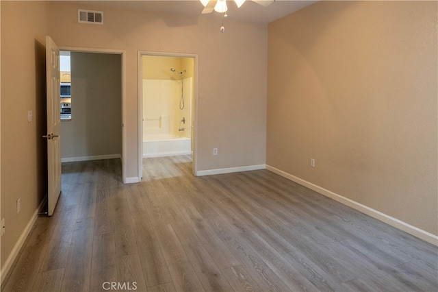 41410 Juniper St Unit 1711, Murrieta, CA 92562 - unfurnished bedroom featuring baseboards, visible vents, and wood finished floors