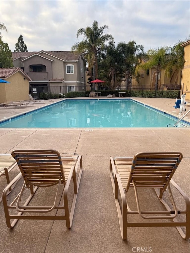 41410 Juniper St Unit 1711, Murrieta, CA 92562 - community pool featuring a patio area and fence