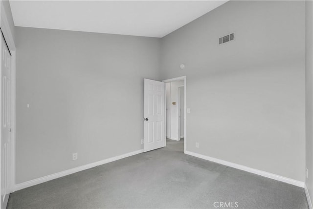 3853 W 182nd St, Torrance, CA 90504 - empty room featuring carpet, baseboards, and high vaulted ceiling