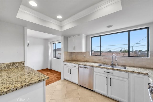 3853 W 182nd St, Torrance, CA 90504 - kitchen with stainless steel dishwasher, a sink, white cabinetry, ornamental molding, and a raised ceiling