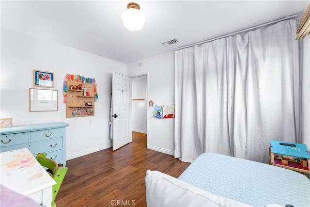 6023 Acacia Ave, Whittier, CA 90601 - bedroom featuring wood finished floors and baseboards
