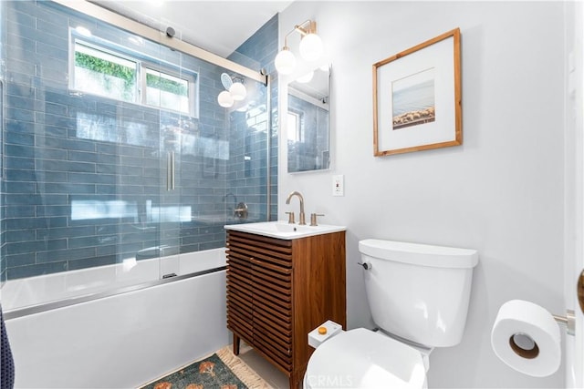 6023 Acacia Ave, Whittier, CA 90601 - bathroom with toilet, vanity, and bath / shower combo with glass door