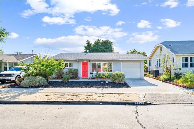 6023 Acacia Ave, Whittier, CA 90601 - single story home with concrete driveway, a garage, and stucco siding