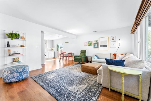 6023 Acacia Ave, Whittier, CA 90601 - living room with wood finished floors