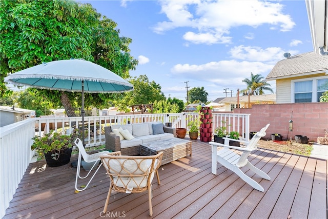 6023 Acacia Ave, Whittier, CA 90601 - wooden deck with an outdoor living space and fence