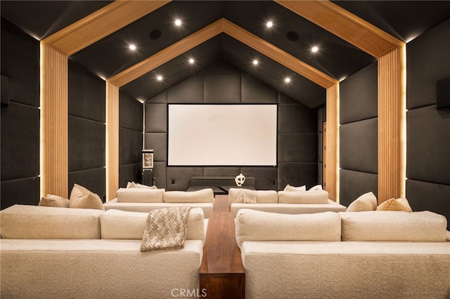 home theater with vaulted ceiling and recessed lighting