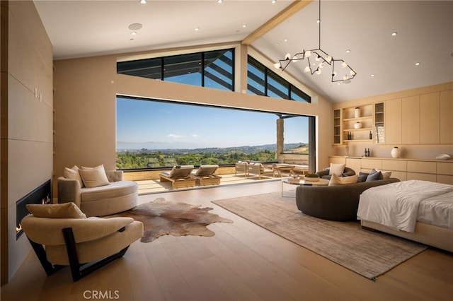 bedroom featuring an inviting chandelier, high vaulted ceiling, wood finished floors, beamed ceiling, and access to exterior