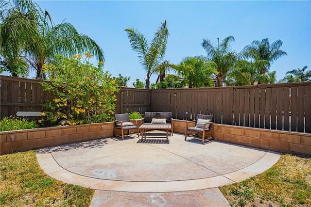 view of patio with a fenced backyard