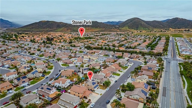 bird's eye view with a residential view and a mountain view