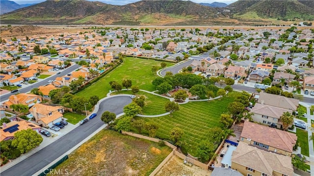birds eye view of property with a residential view and a mountain view