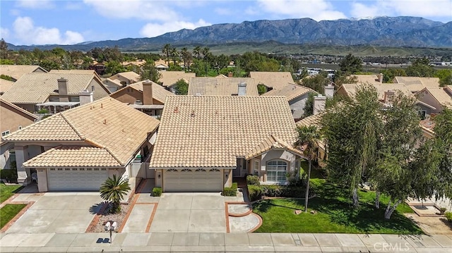 4839 W Forest Oaks Ave, Banning, CA 92220 - aerial perspective of suburban area featuring a mountainous background