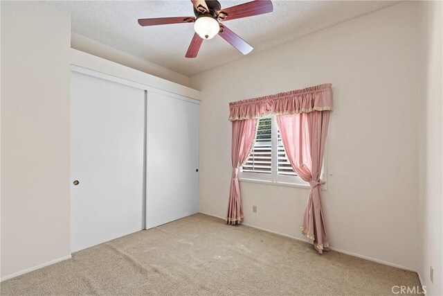 4839 W Forest Oaks Ave, Banning, CA 92220 - unfurnished bedroom with carpet floors, a closet, and ceiling fan