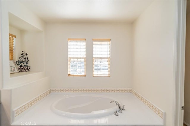 full bathroom with a garden tub
