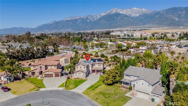 aerial view featuring a mountain view and a residential view