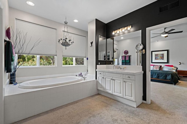 bathroom featuring carpet flooring, a garden tub, visible vents, vanity, and recessed lighting