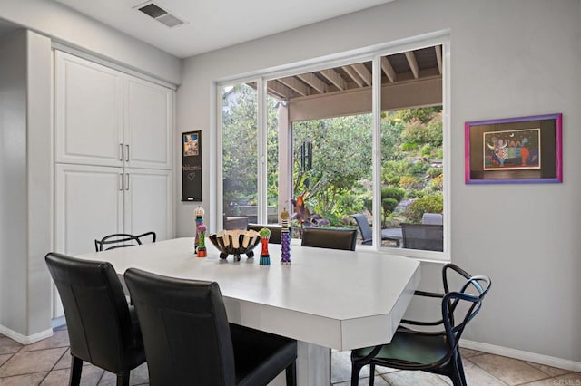 5054 Seachase Way, San Diego, CA 92130 - dining area with baseboards and light tile patterned floors