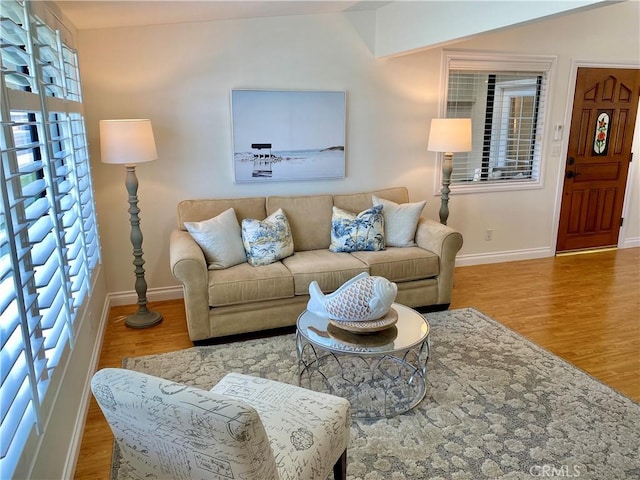 13310 Fairfield Ln Unit M7-176B, Seal Beach, CA 90740 - living room featuring wood finished floors and baseboards
