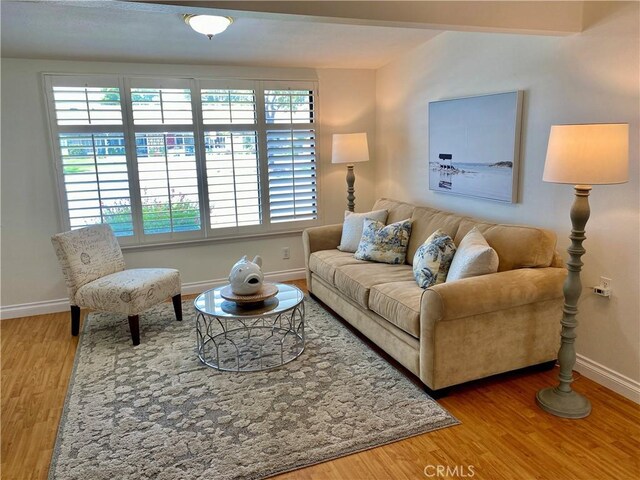 13310 Fairfield Ln Unit M7-176B, Seal Beach, CA 90740 - living room with wood finished floors and plenty of natural light