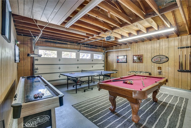 recreation room featuring billiards, wooden walls, and concrete floors