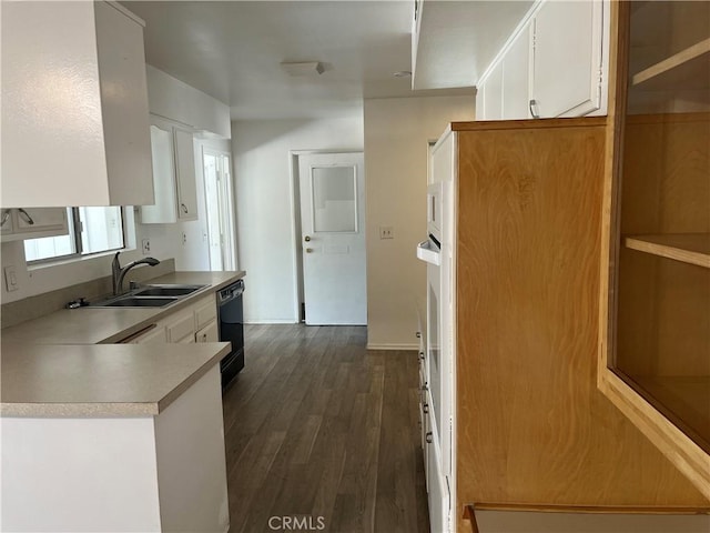 28960 Olympia Way, Menifee, CA 92586 - kitchen featuring black dishwasher, a sink, white cabinets, light countertops, and dark wood-style floors