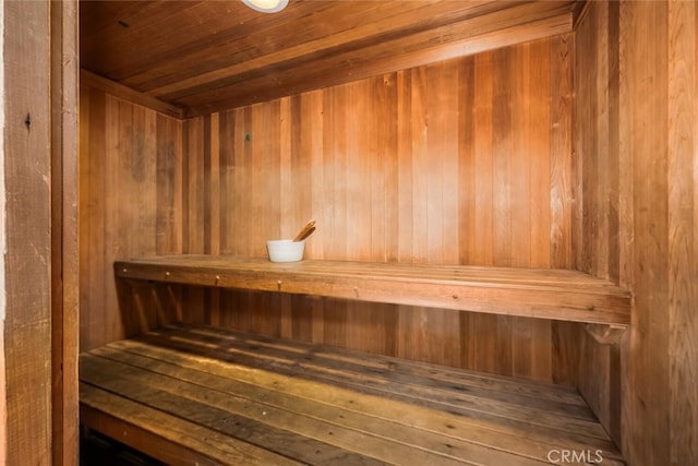 sauna with wood ceiling