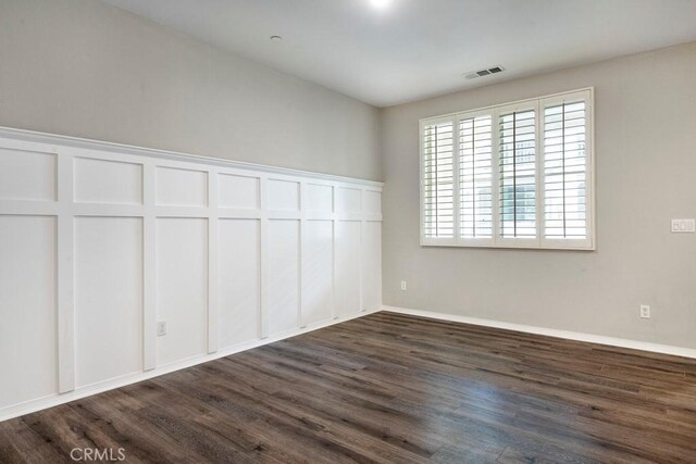 2785 Berry Loop Privado Unit 12, Ontario, CA 91761 - spare room featuring dark wood finished floors and baseboards