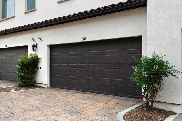 2785 Berry Loop Privado Unit 12, Ontario, CA 91761 - garage with driveway