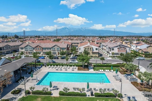 2785 Berry Loop Privado Unit 12, Ontario, CA 91761 - community pool with a mountain view, a residential view, and a patio