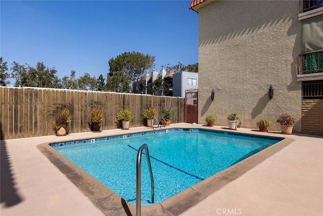 5875 Doverwood Dr Unit 309, Culver City, CA 90230 - view of swimming pool featuring fence and a patio