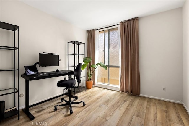 5875 Doverwood Dr Unit 309, Culver City, CA 90230 - office area with wood finished floors and baseboards