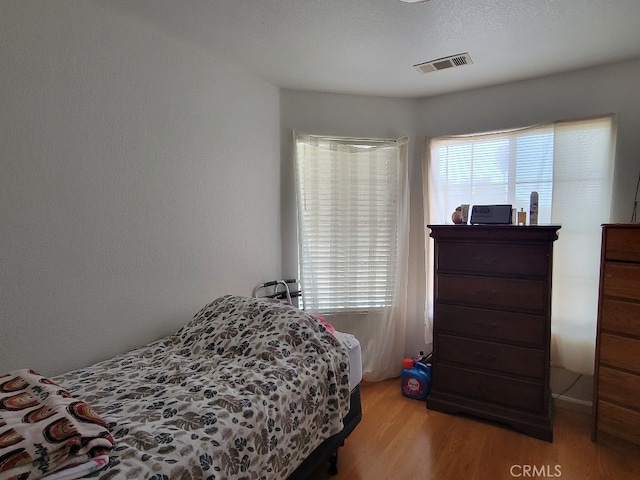 628 Vintner St, Los Banos, CA 93635 - bedroom featuring visible vents and wood finished floors