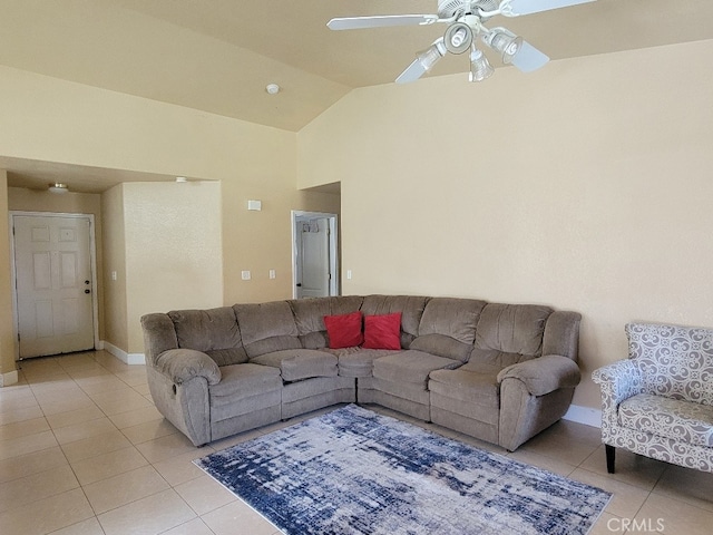 628 Vintner St, Los Banos, CA 93635 - living room with light tile patterned floors, baseboards, ceiling fan, and high vaulted ceiling