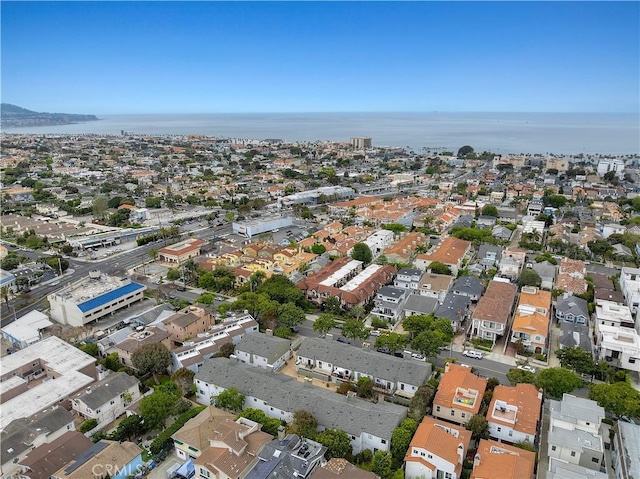 aerial view with a water view and a residential view