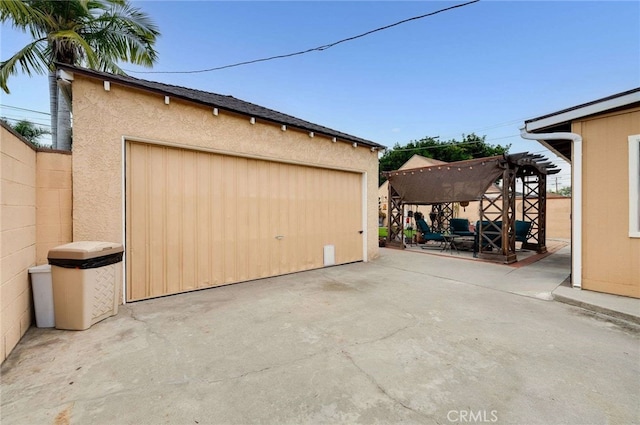 detached garage with fence