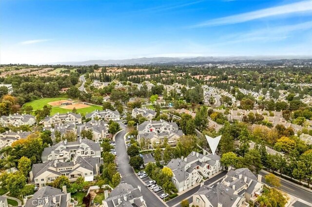 aerial overview of property's location with nearby suburban area