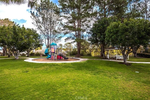 community play area featuring a yard and a gazebo