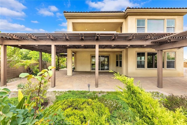 5467 Lisboa St, Chino Hills, CA 91709 - rear view of property featuring stucco siding, a pergola, fence, and a patio