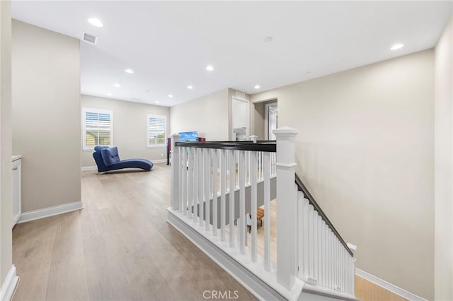 5467 Lisboa St, Chino Hills, CA 91709 - hall with an upstairs landing, wood finished floors, baseboards, and recessed lighting
