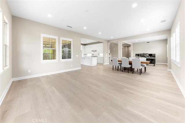 5467 Lisboa St, Chino Hills, CA 91709 - dining room with light wood-style floors, baseboards, and recessed lighting