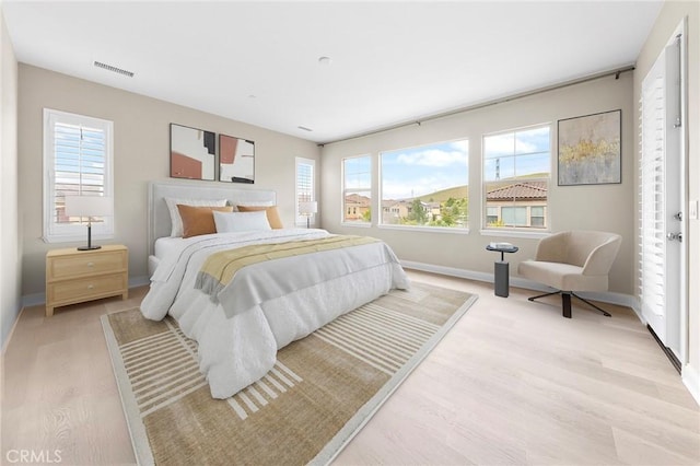5467 Lisboa St, Chino Hills, CA 91709 - bedroom with baseboards, light wood finished floors, and multiple windows