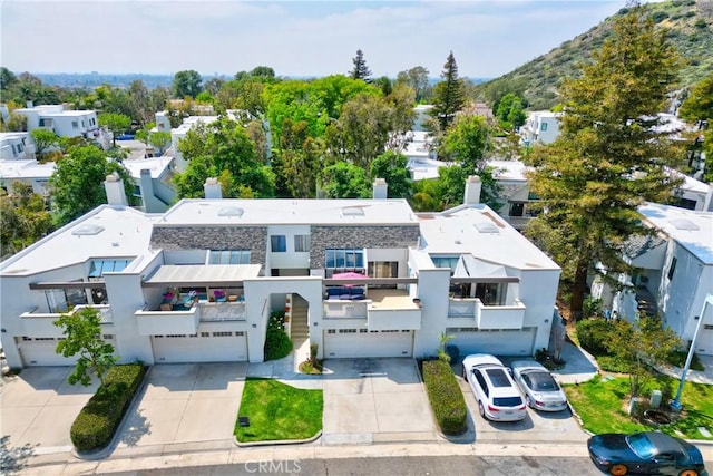 aerial perspective of suburban area featuring mountains