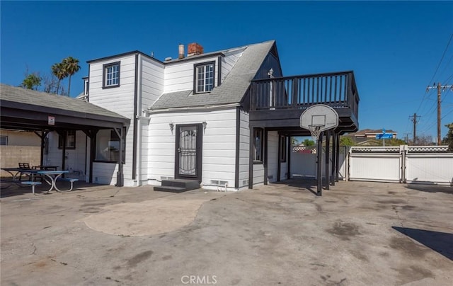 1949 Lancewood Ave, Hacienda Heights, CA 91745 - view of front of home with fence, a shingled roof, a chimney, and a gate