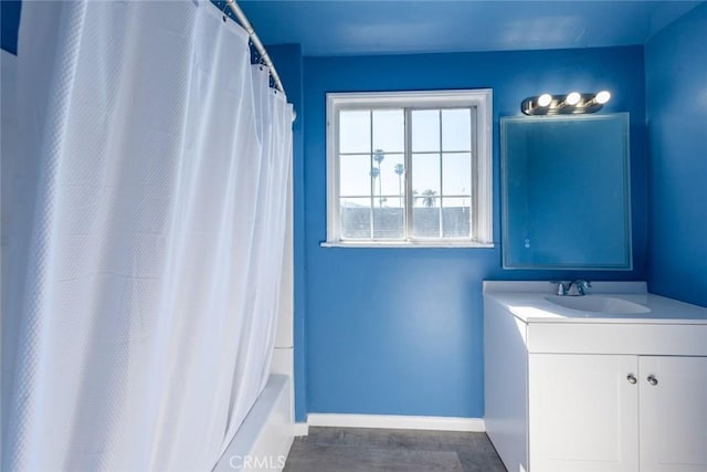 1949 Lancewood Ave, Hacienda Heights, CA 91745 - bathroom featuring vanity, baseboards, and shower / tub combo with curtain