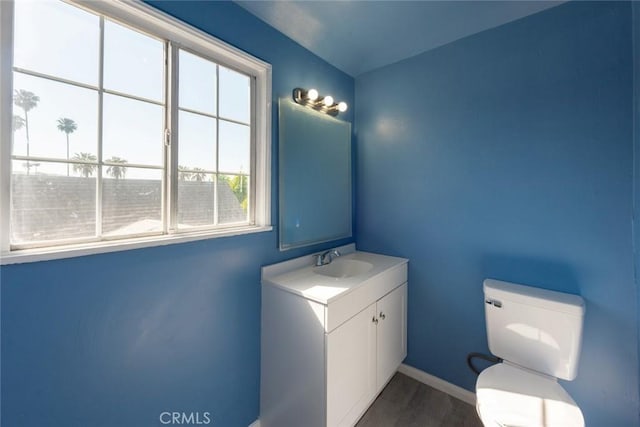 1949 Lancewood Ave, Hacienda Heights, CA 91745 - bathroom with healthy amount of natural light, toilet, wood finished floors, and vanity