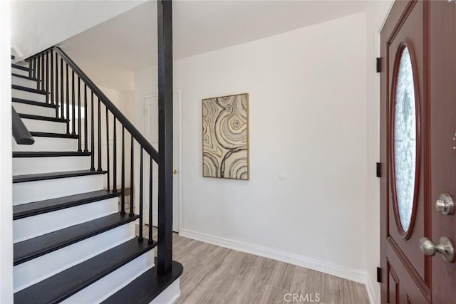 1949 Lancewood Ave, Hacienda Heights, CA 91745 - entrance foyer with stairs, light wood-style floors, and baseboards